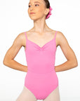 Female dancer wearing Odette Lolly mid pink adjustable strap ballet leotard