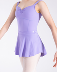 Girl wearing light purple ballet skirt