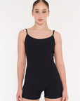 Young woman wearing ribbed activewear black bodysuit
