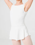 Girl wearing white ballet skirt